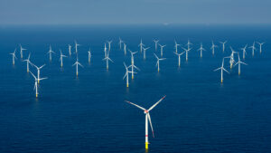 Alternative energy - Aerial view of offshore windmill park at sea.